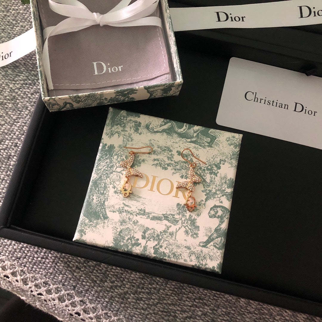 DI* butterfly diamond earrings