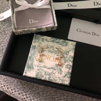 DI* butterfly diamond earrings