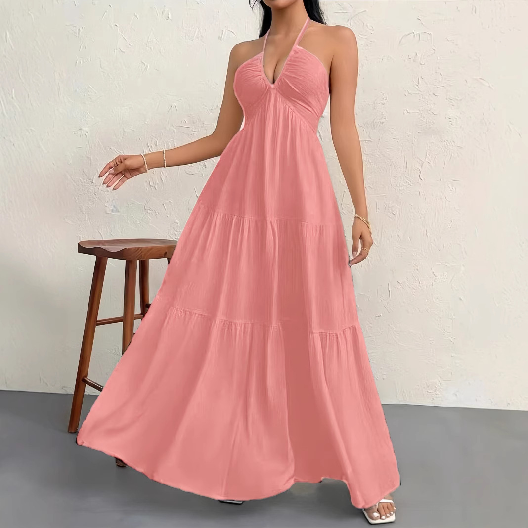 Sleeveless crepe dress with tie-neck and open back.