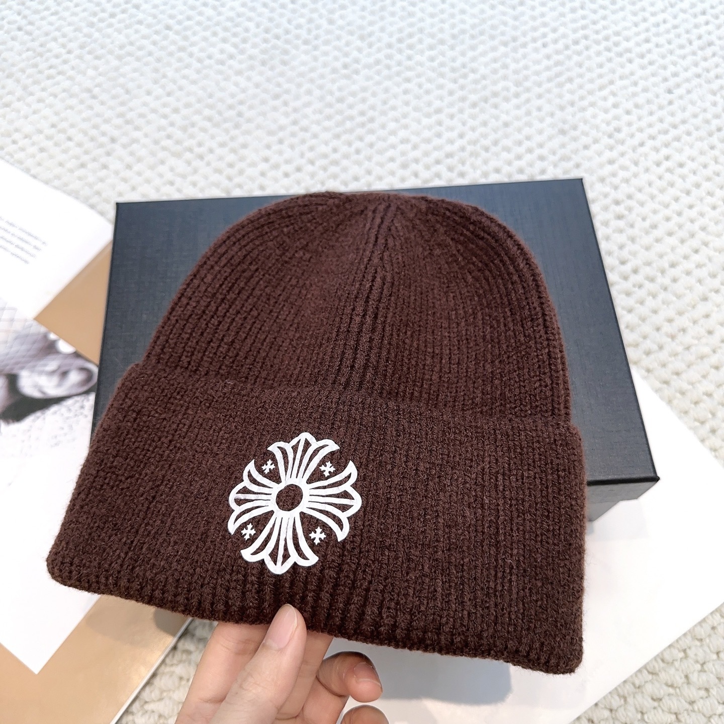 New autumn/winter collection knitted beanie with a cross design.