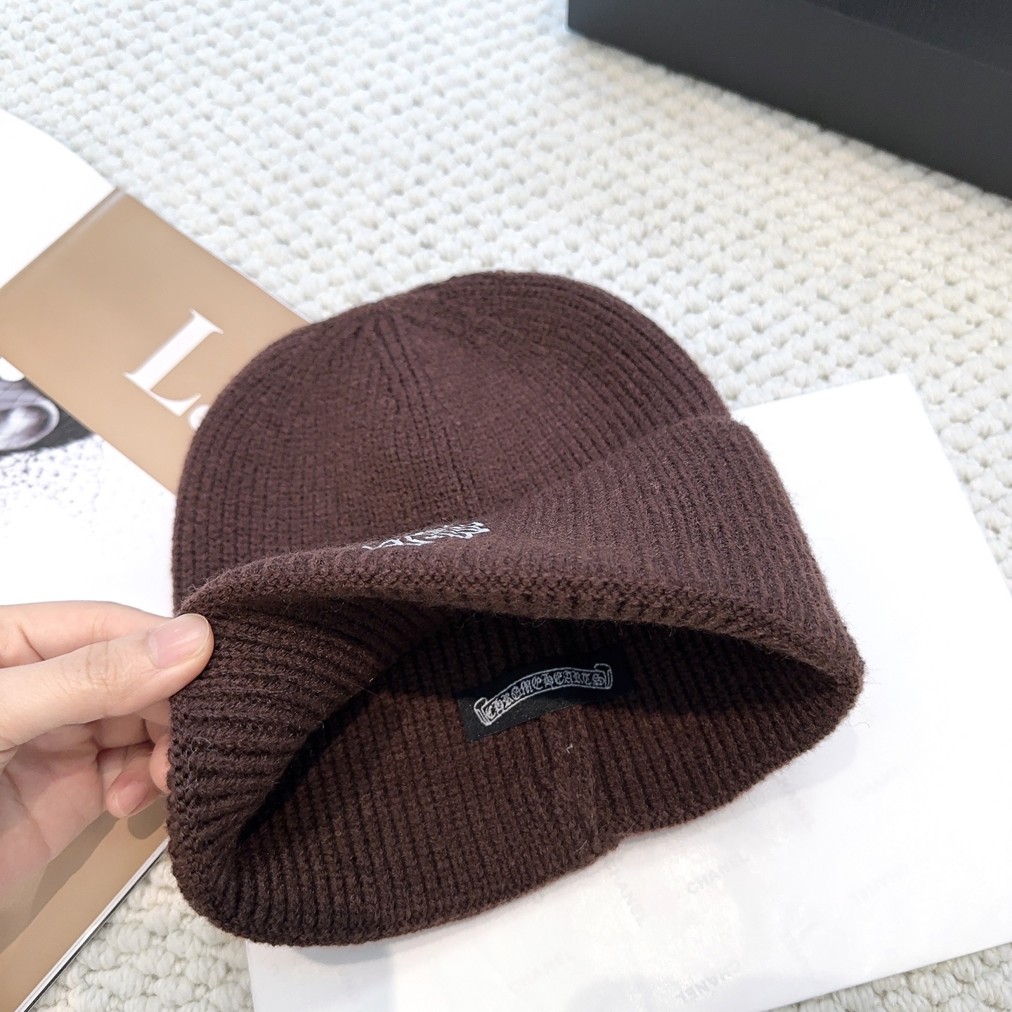 New autumn/winter collection knitted beanie with a cross design.