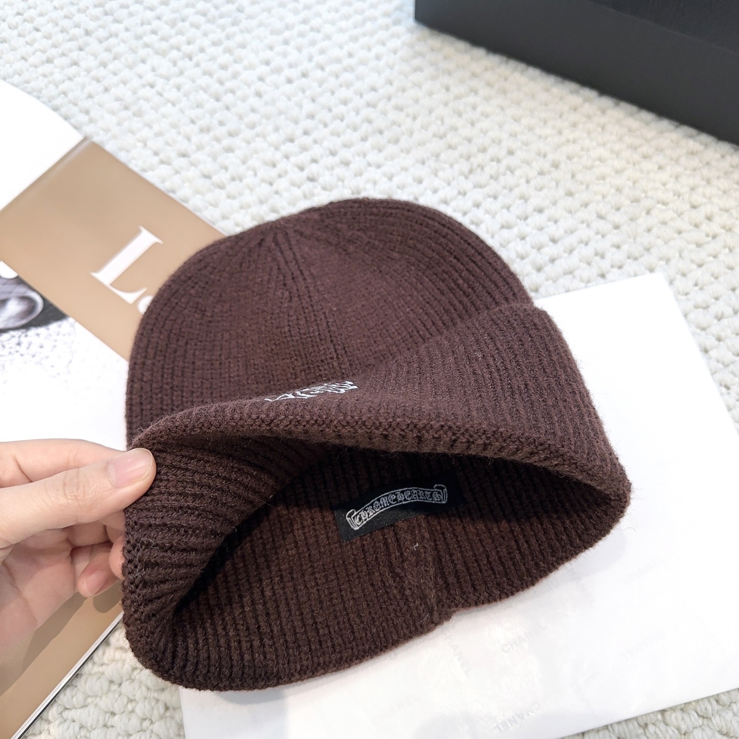 New autumn/winter collection knitted beanie with a cross design.