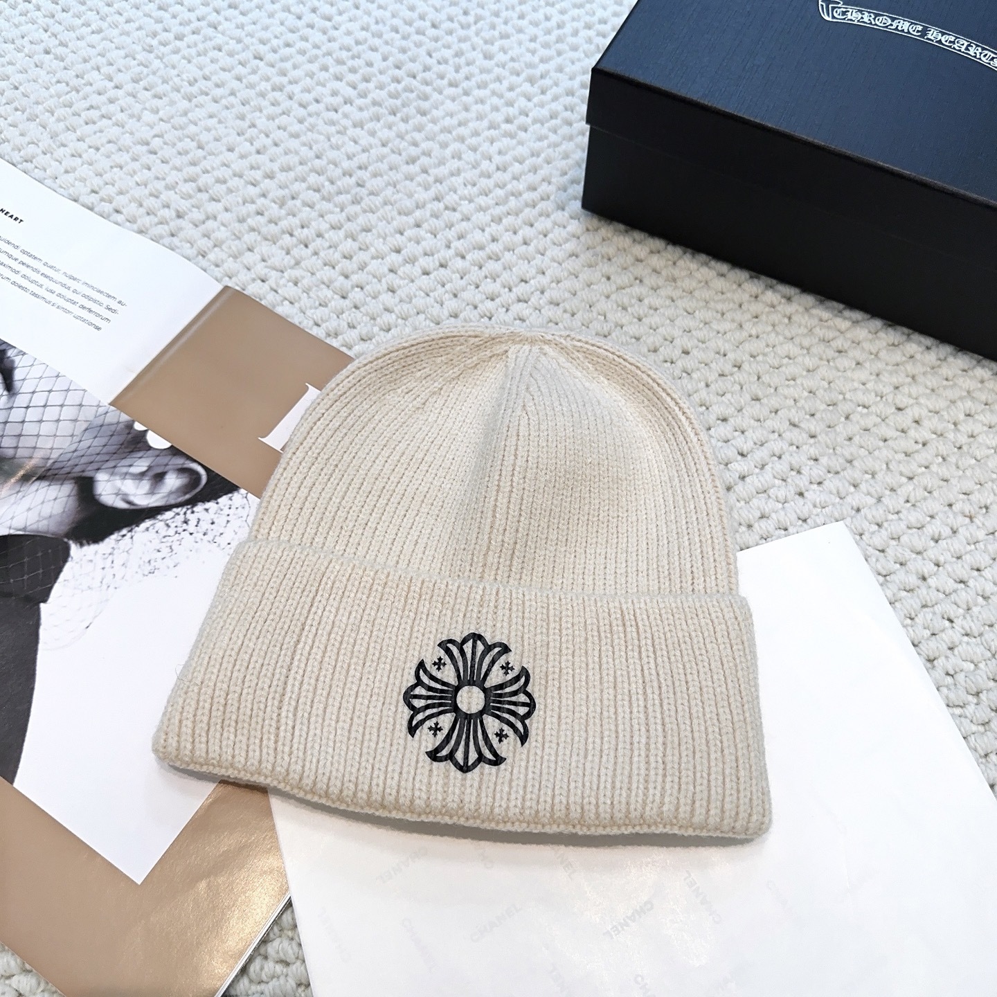 New autumn/winter collection knitted beanie with a cross design.