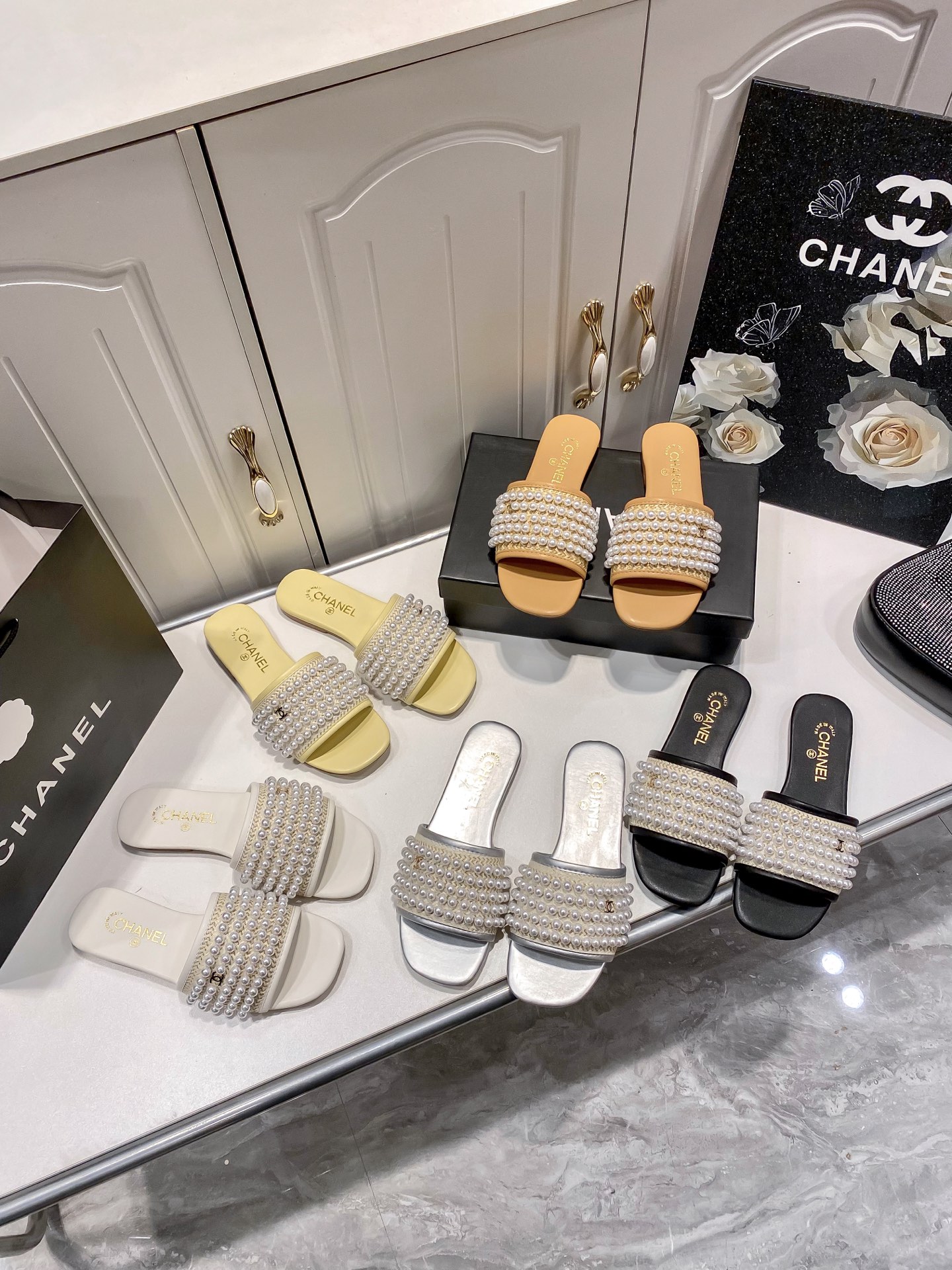 New pearl-embellished flat sandals