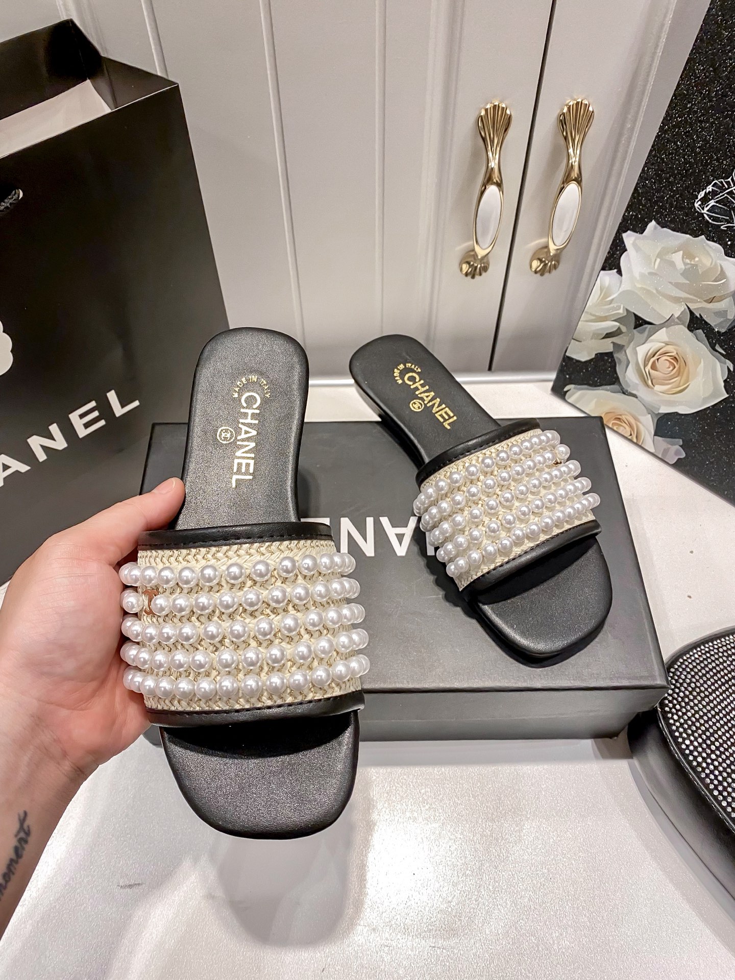 New pearl-embellished flat sandals