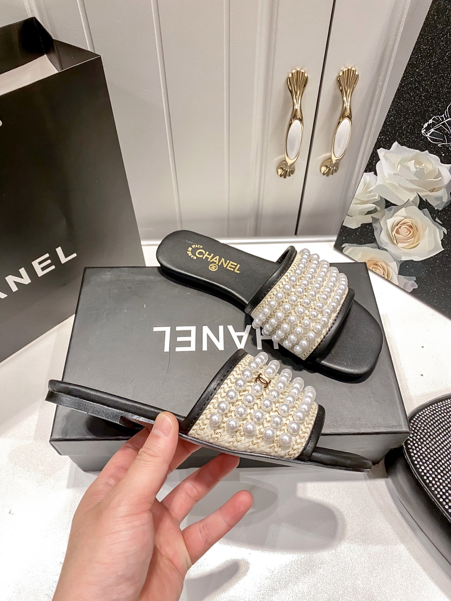 New pearl-embellished flat sandals