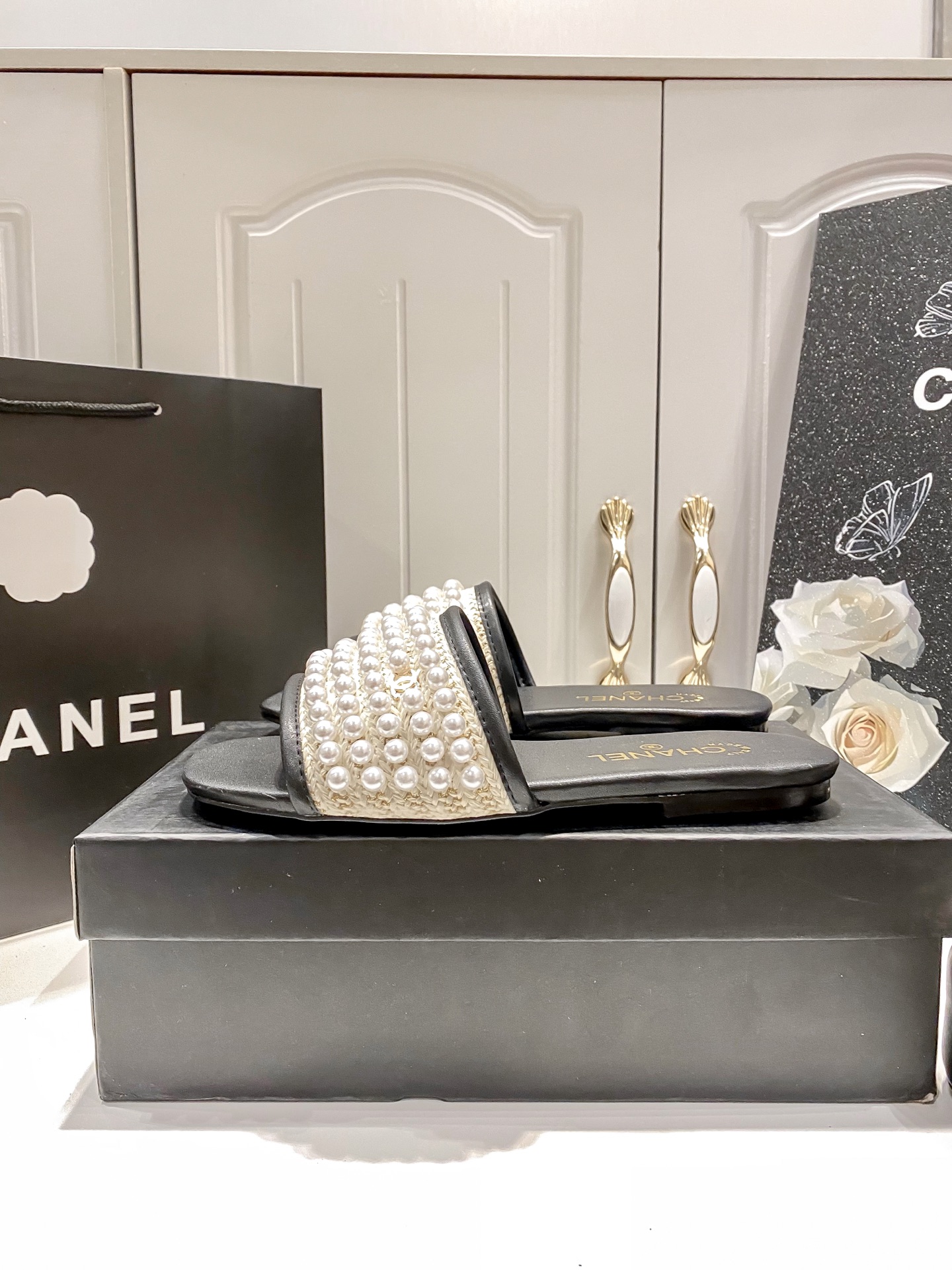 New pearl-embellished flat sandals