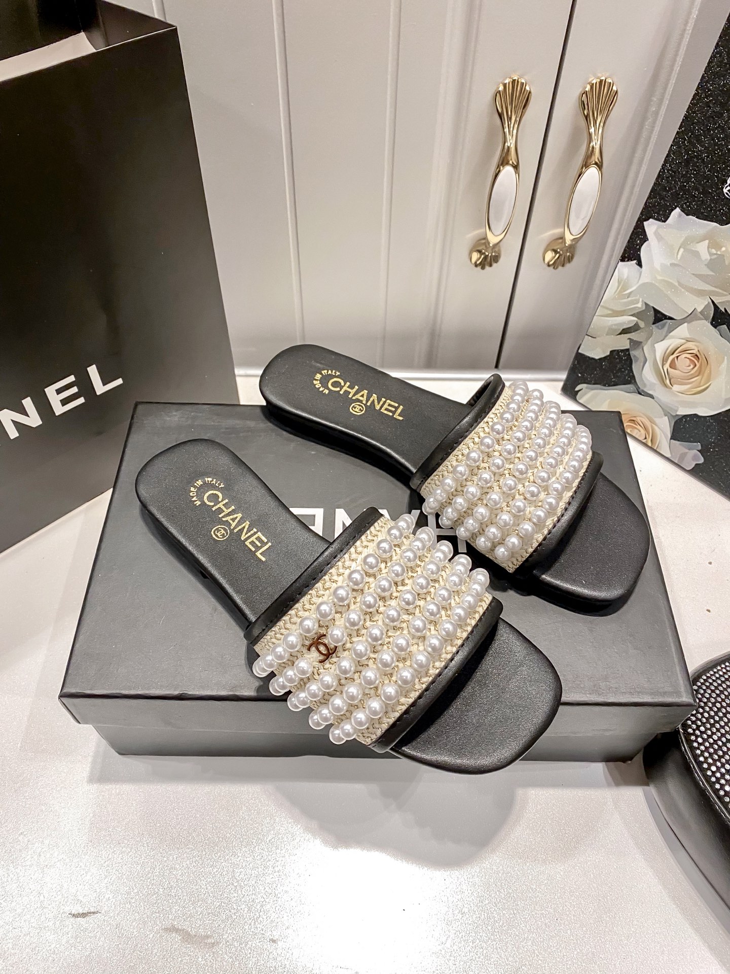 New pearl-embellished flat sandals
