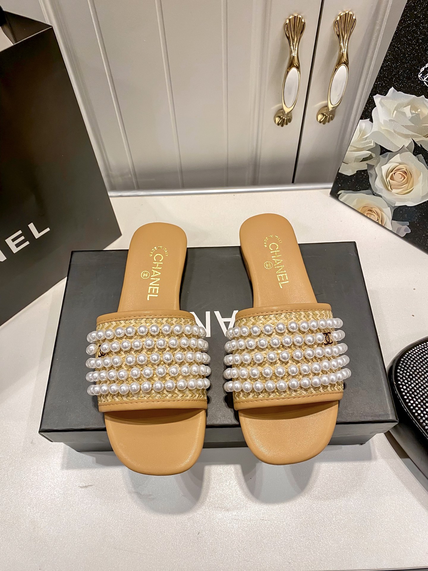 New pearl-embellished flat sandals