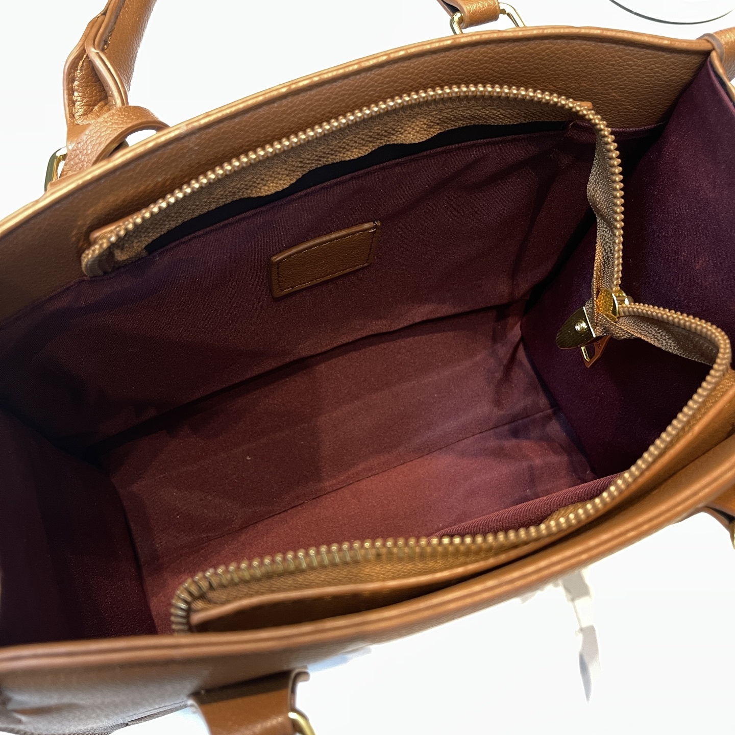 Vintage embossed letter handbag