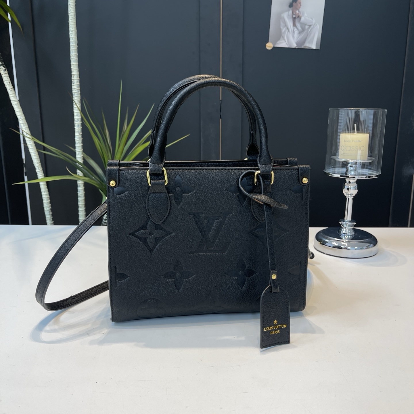 Vintage embossed letter handbag