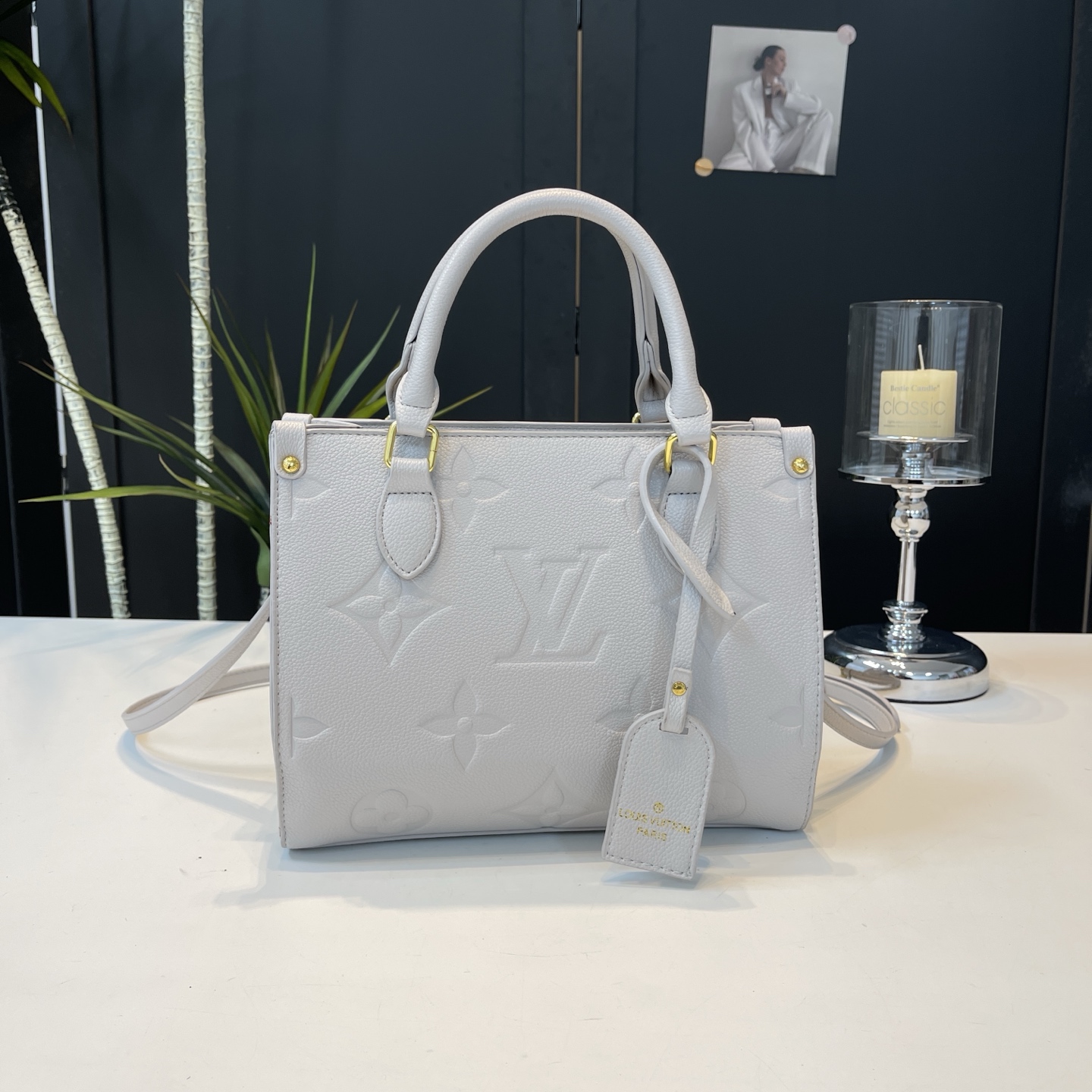 Vintage embossed letter handbag