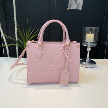 Vintage embossed letter handbag