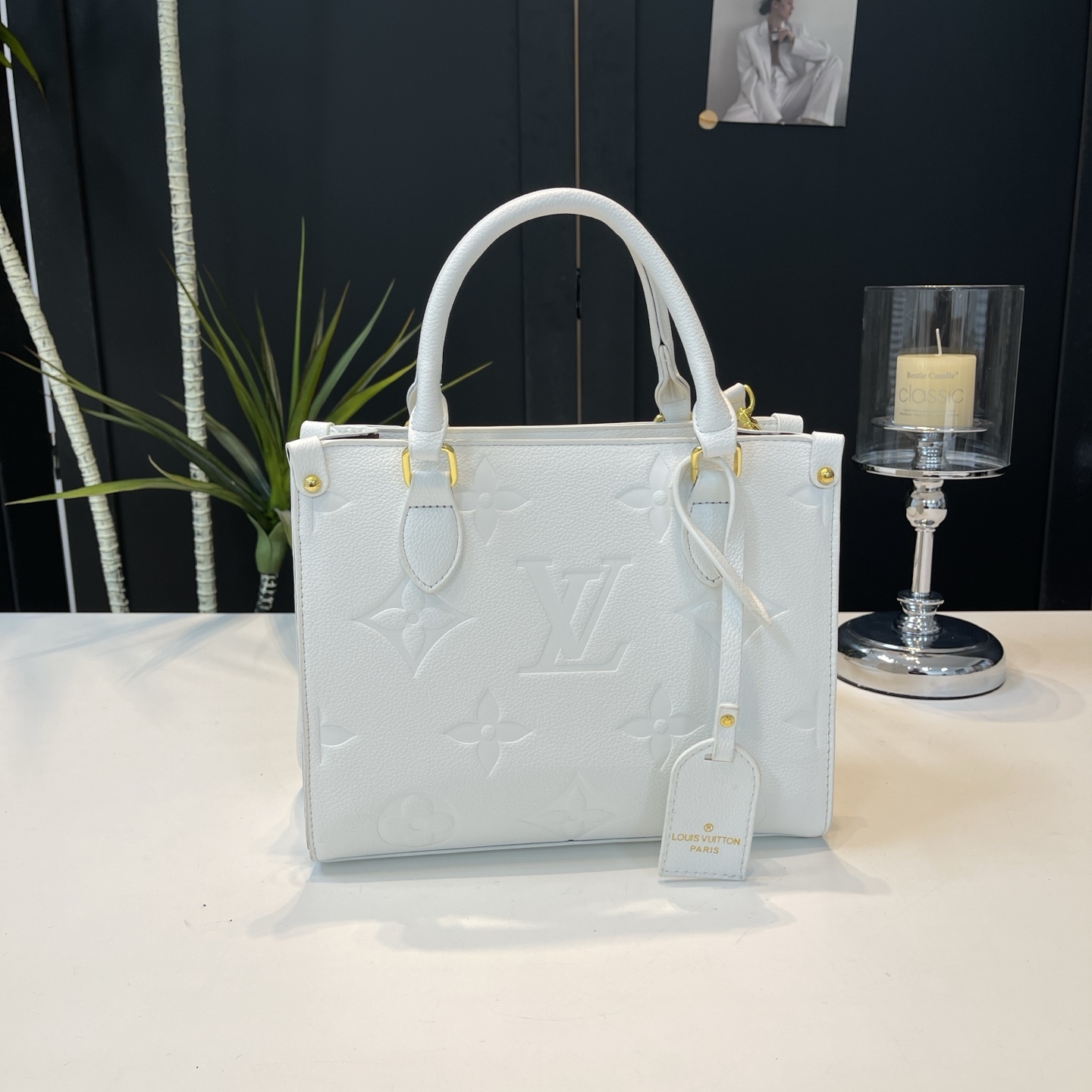 Vintage embossed letter handbag