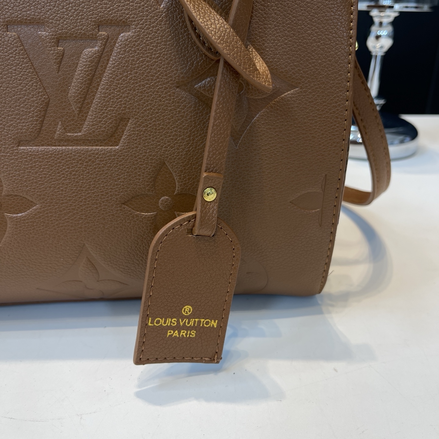 Vintage embossed letter handbag