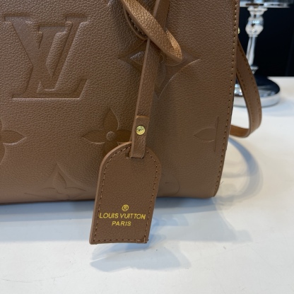 Vintage embossed letter handbag