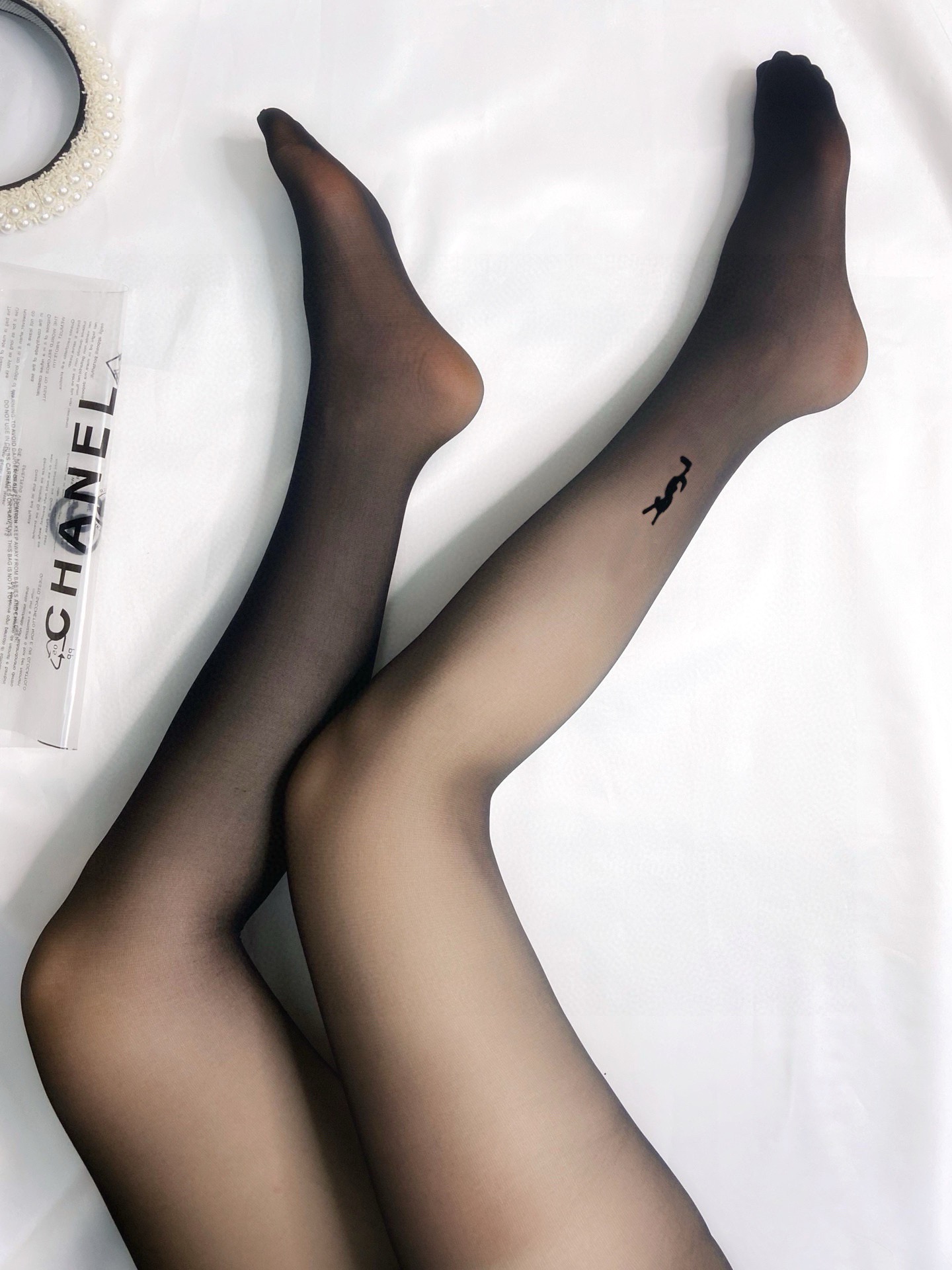 Classic flocked YSL logo tights