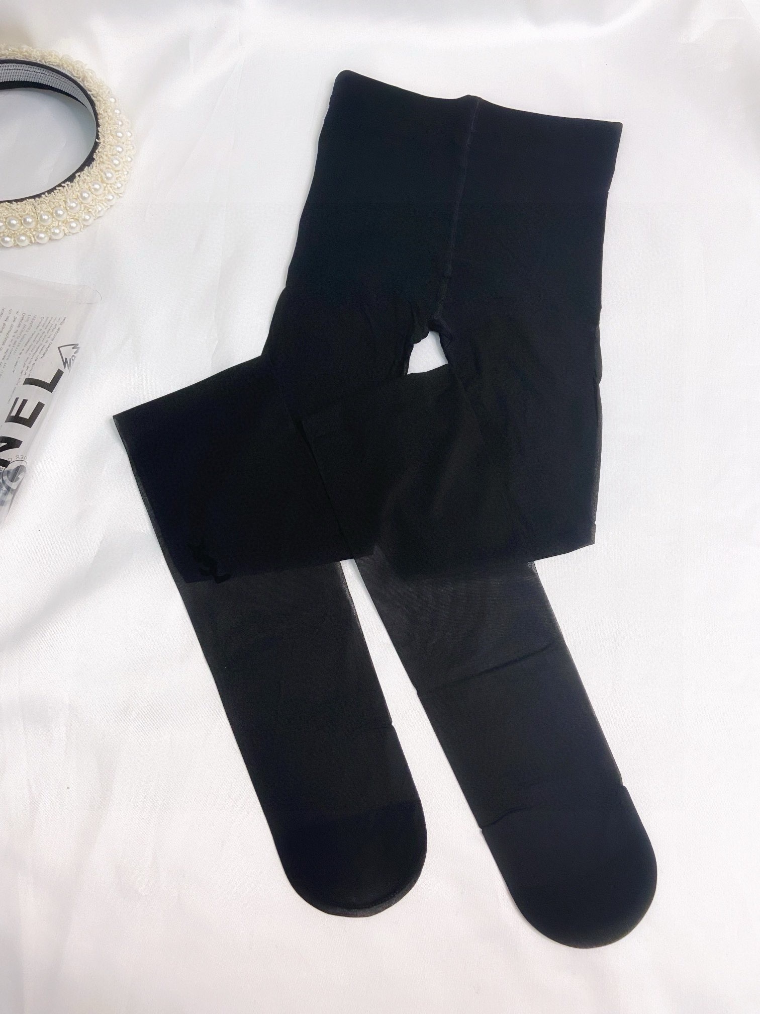 Classic flocked YSL logo tights