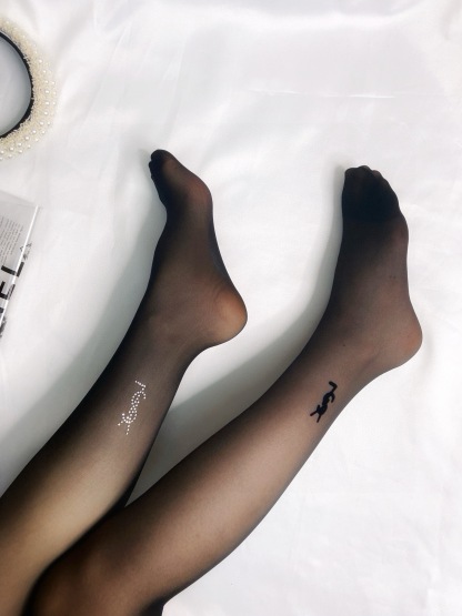 Classic flocked YSL logo tights