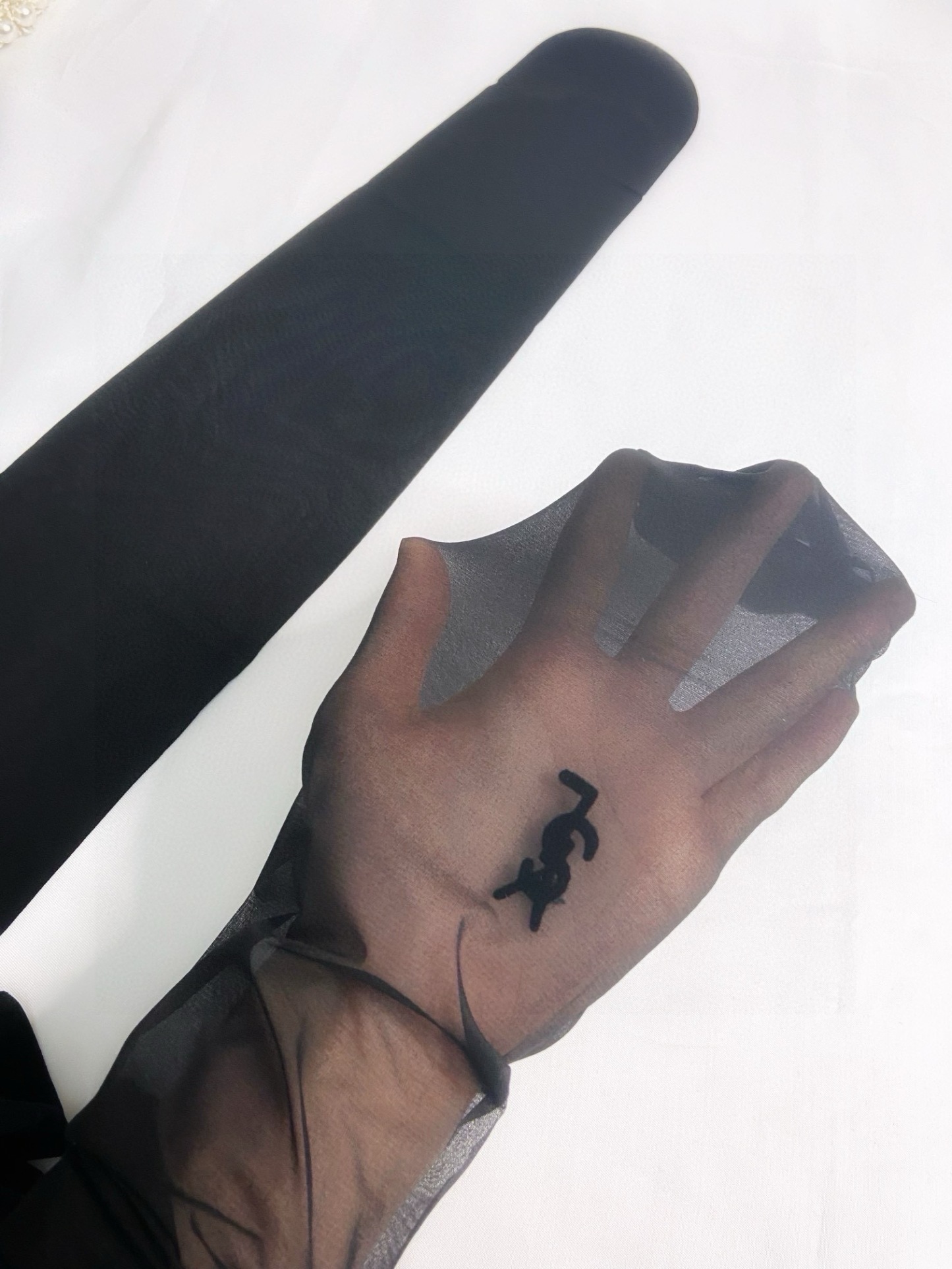 Classic flocked YSL logo tights