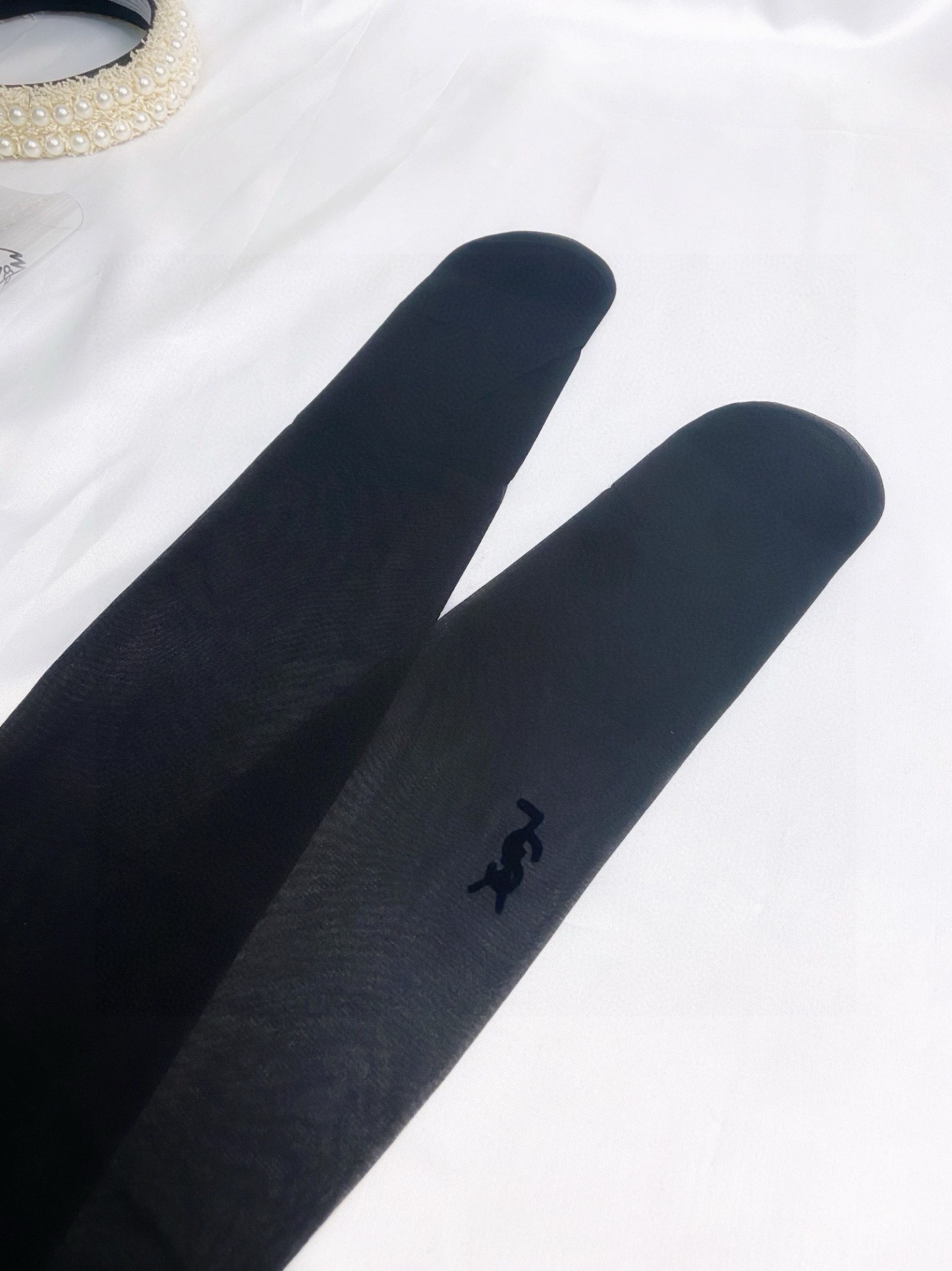 Classic flocked YSL logo tights