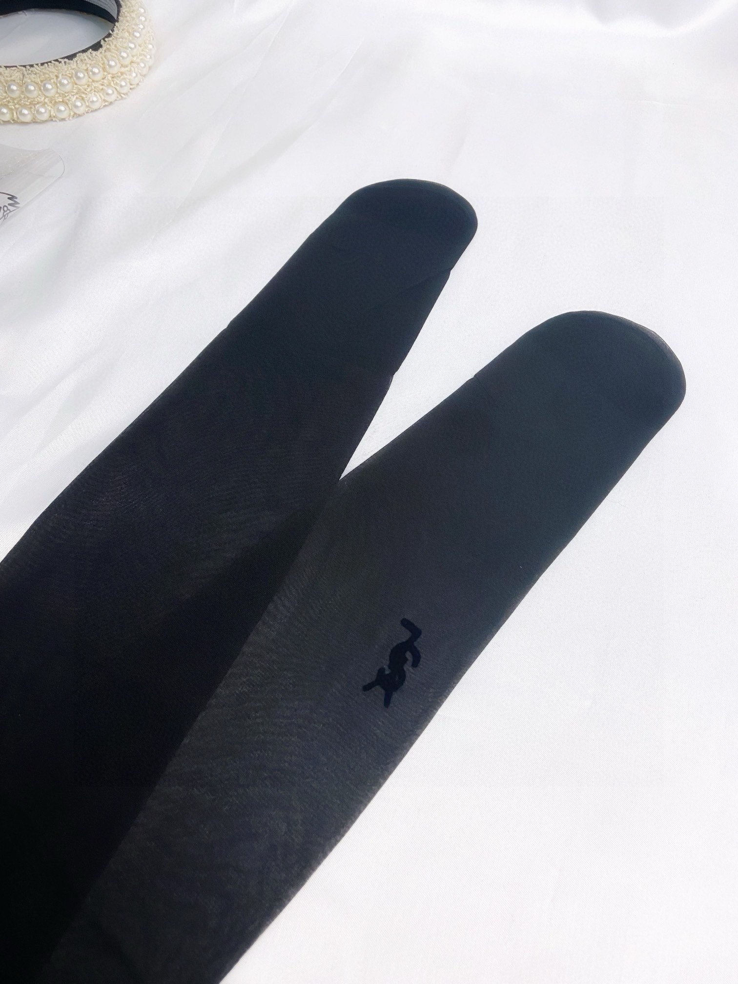 Classic flocked YSL logo tights