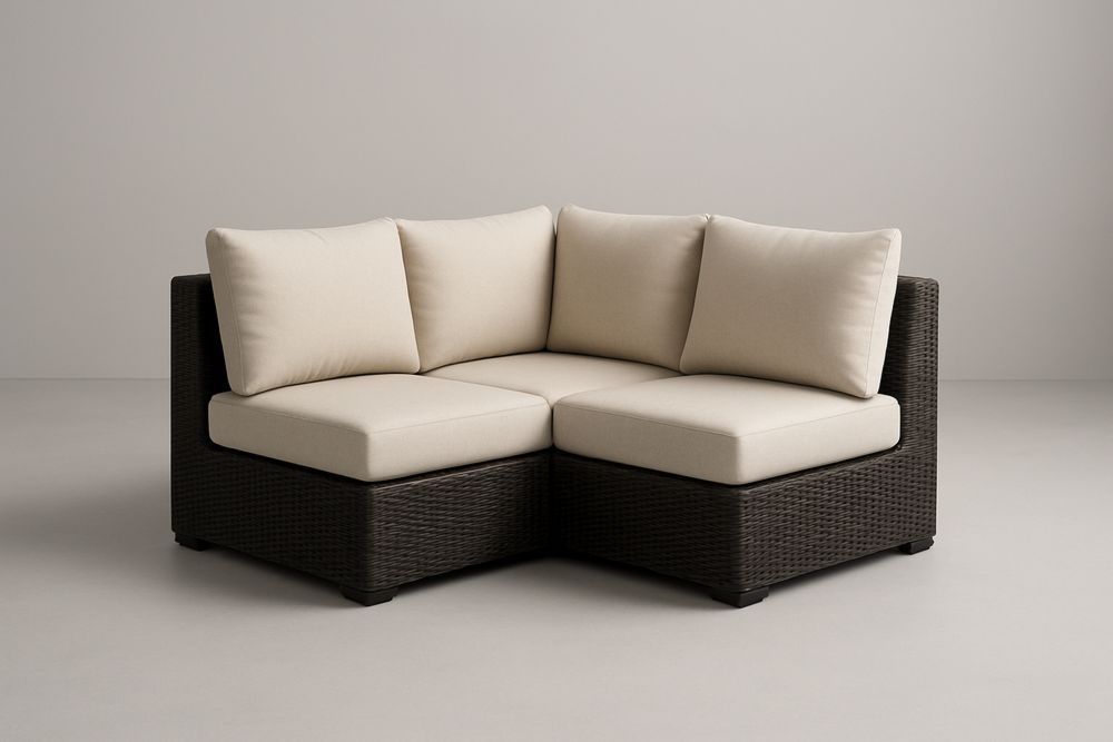 Divano angolare da esterno in rattan con cuscini in poliestere beige