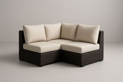 Divano angolare da esterno in rattan con cuscini in poliestere beige