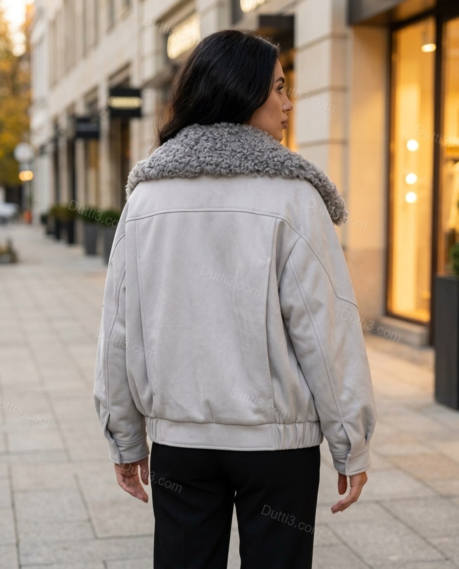 Pale Grey Jacket, three-quarter brand lifestyle view, by Dutti3