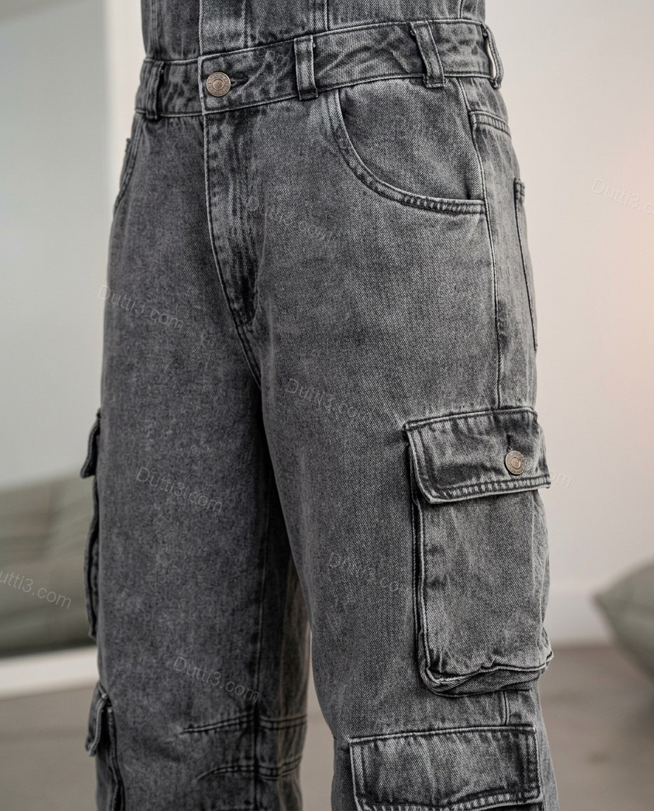 Dark Grey Strapless Denim Jumpsuit, close-up of belt loops, button and zip fly closure and front pockets, by Dutti3