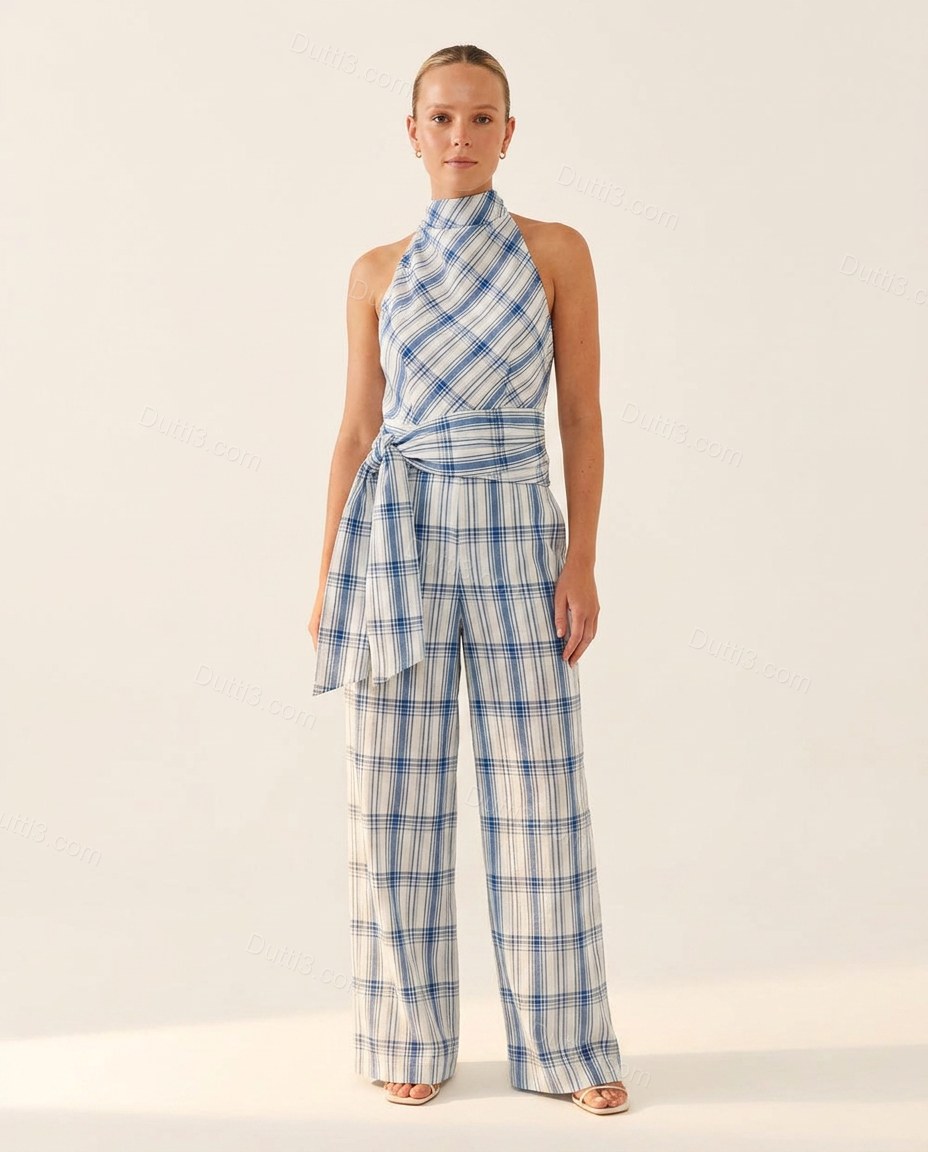 White Polished Textured Halter Jumpsuit by Dutti3