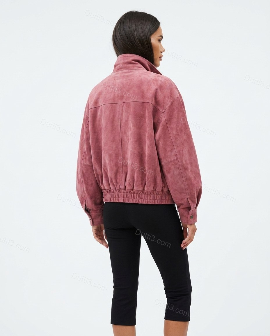 Pink Ribbed Jacket, back studio view showing horizontal back yoke seam with gathered elasticated hem, by Dutti3