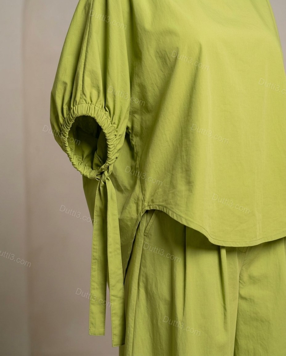 Lime Green Cotton Top & Pants Set, close-up of elasticized sleeve cuffs, side tie details on top and side pockets on pants, by Dutti3