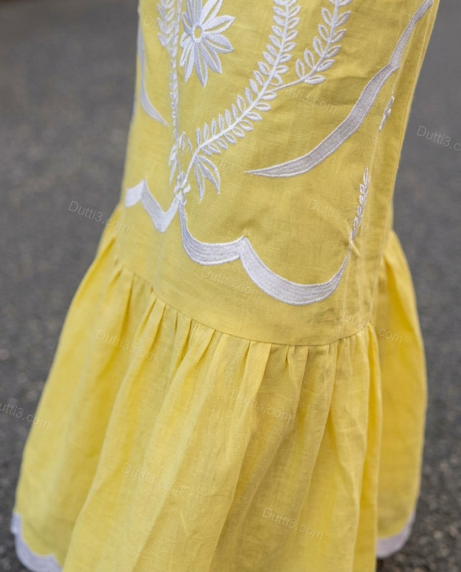 Yellow Maxi Embroidered Ruffled Dress, close-up of white embroidery, ruffled hem and scalloped trim, by Dutti3