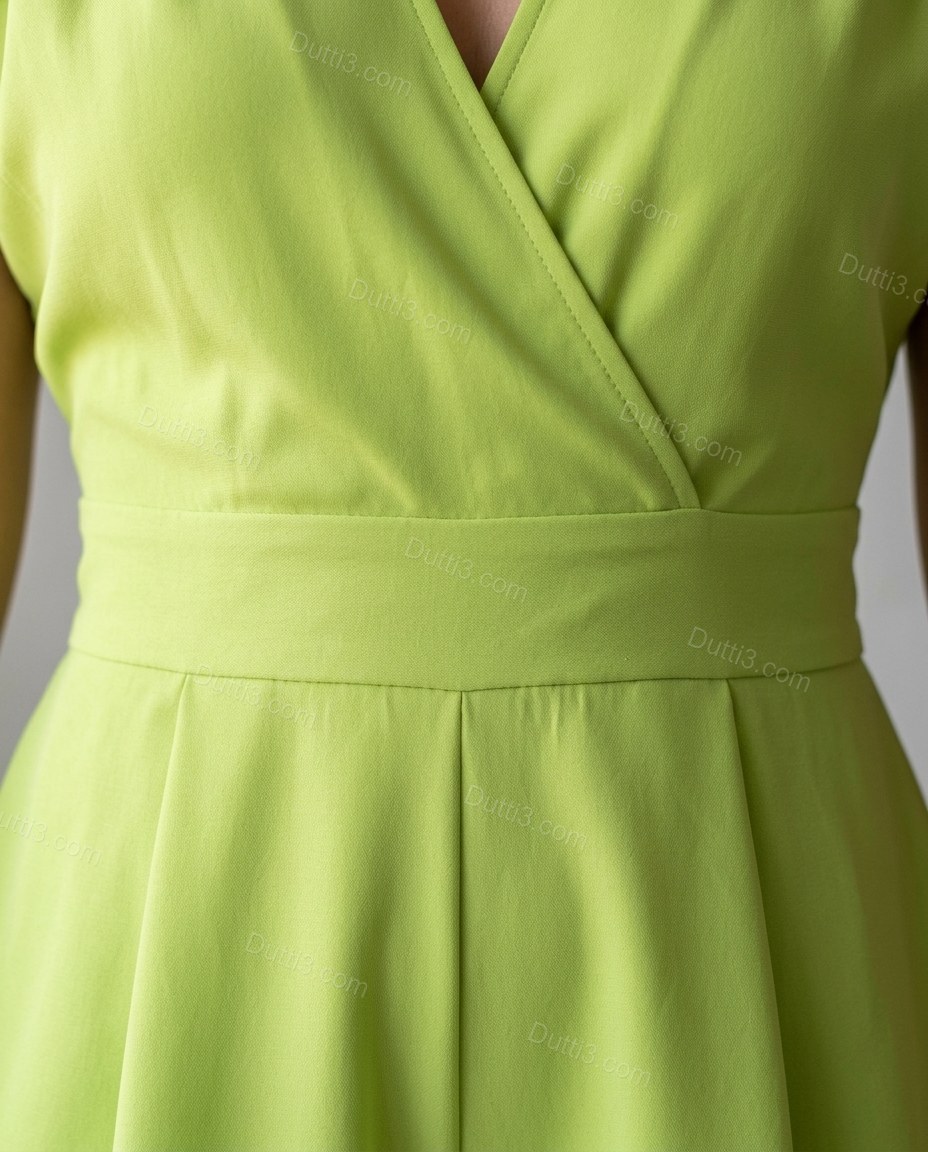 Green Mini Open-Back Halter Jumpsuit, close-up of open back, back zipper and tie neck, by Dutti3