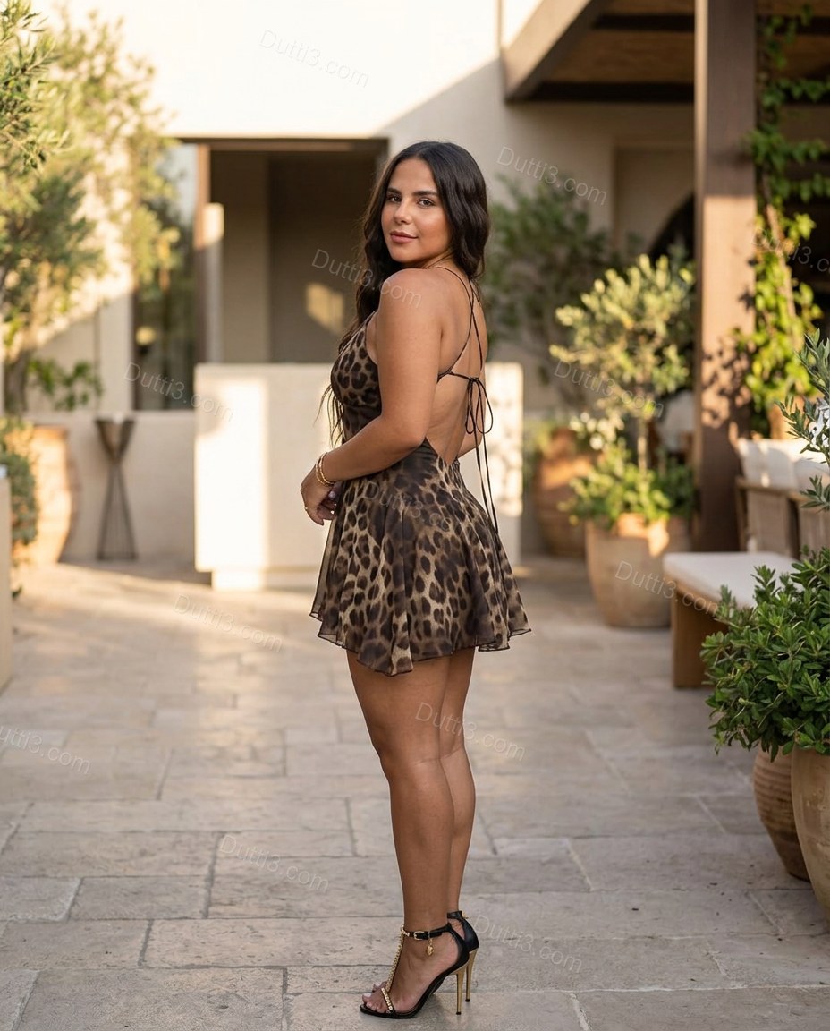Brown Leopard Print Mini Open-Back Dress, three-quarter brand lifestyle view, by Dutti3