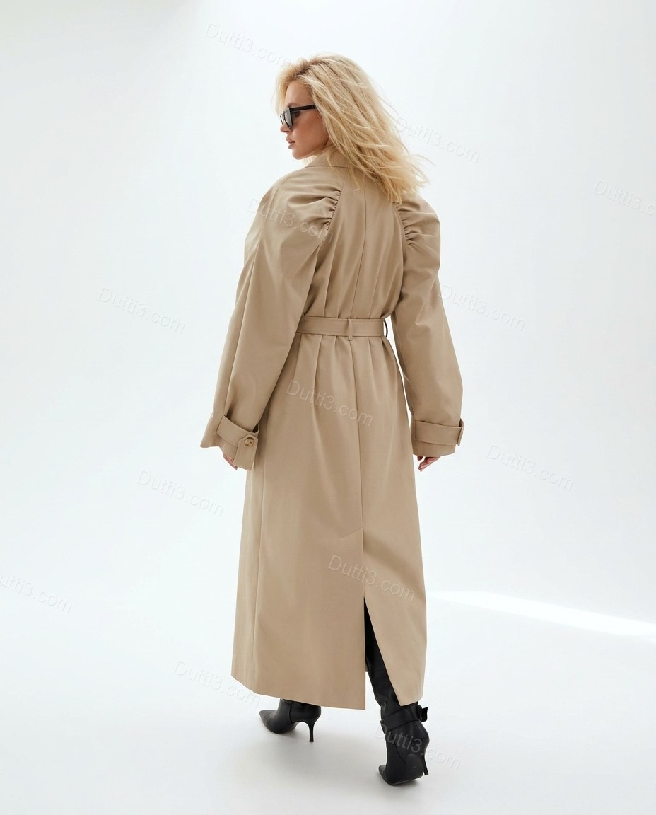 Beige Pleated Coat, back studio view showing clean back with central vertical seam and vent, by Dutti3