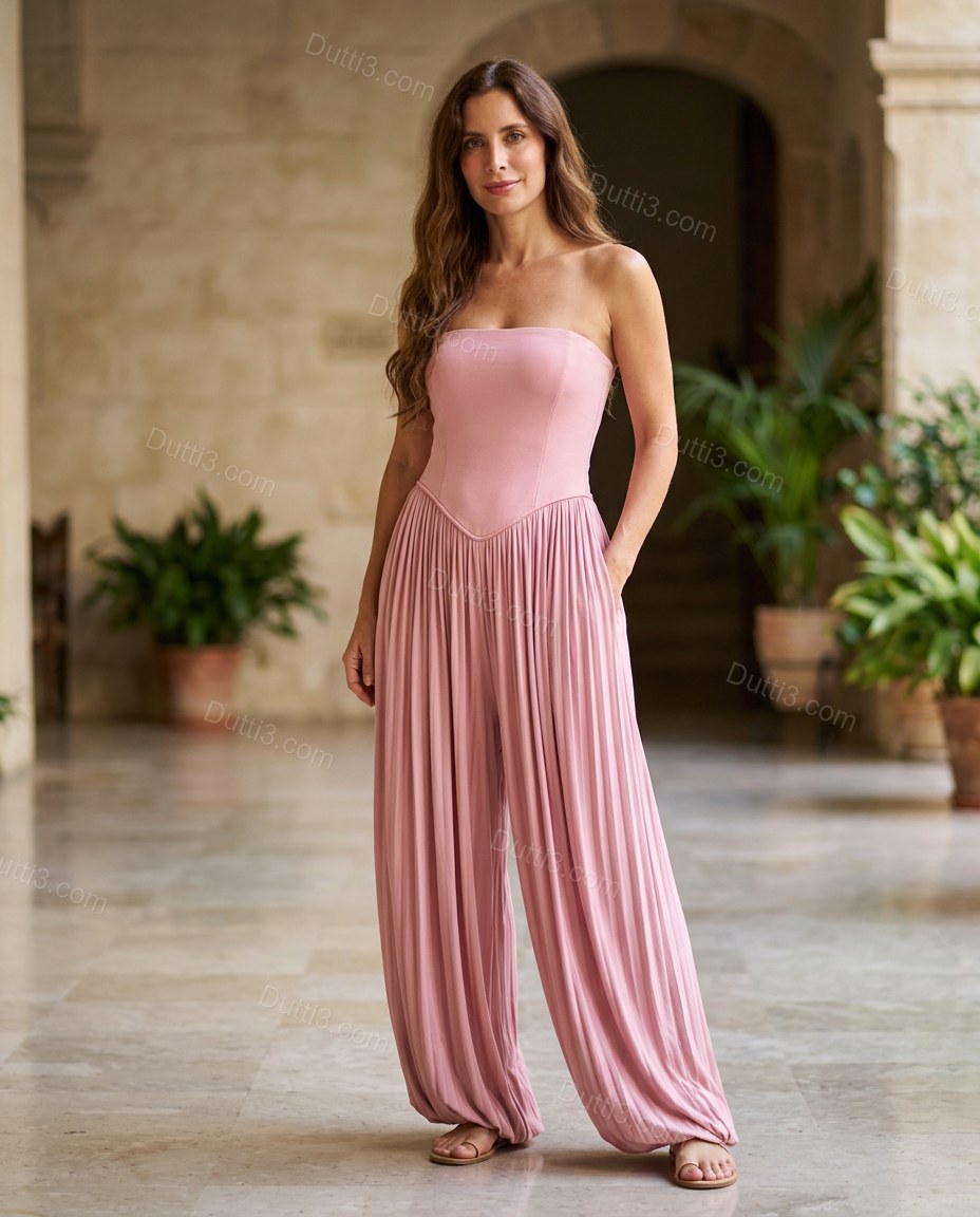 Pink Strapless Pleated Jumpsuit, three-quarter brand lifestyle view, by Dutti3