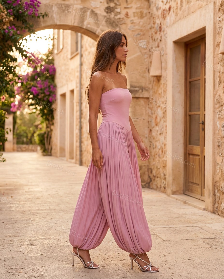 Pink Strapless Pleated Jumpsuit, walking lifestyle view, by Dutti3