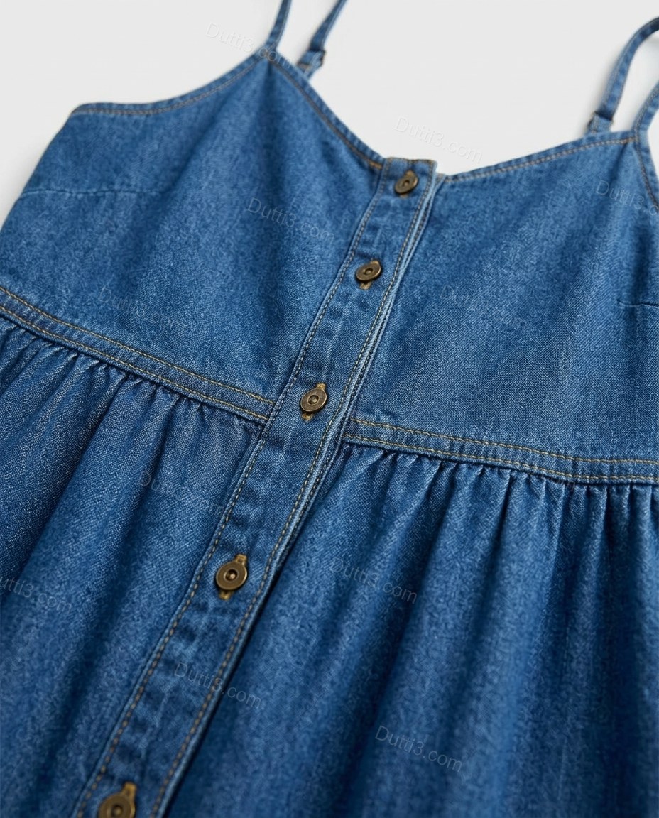 Blue Maxi Tiered Denim Dress, close-up of tiered skirt overlay, tie-back closure and spaghetti straps, by Dutti3