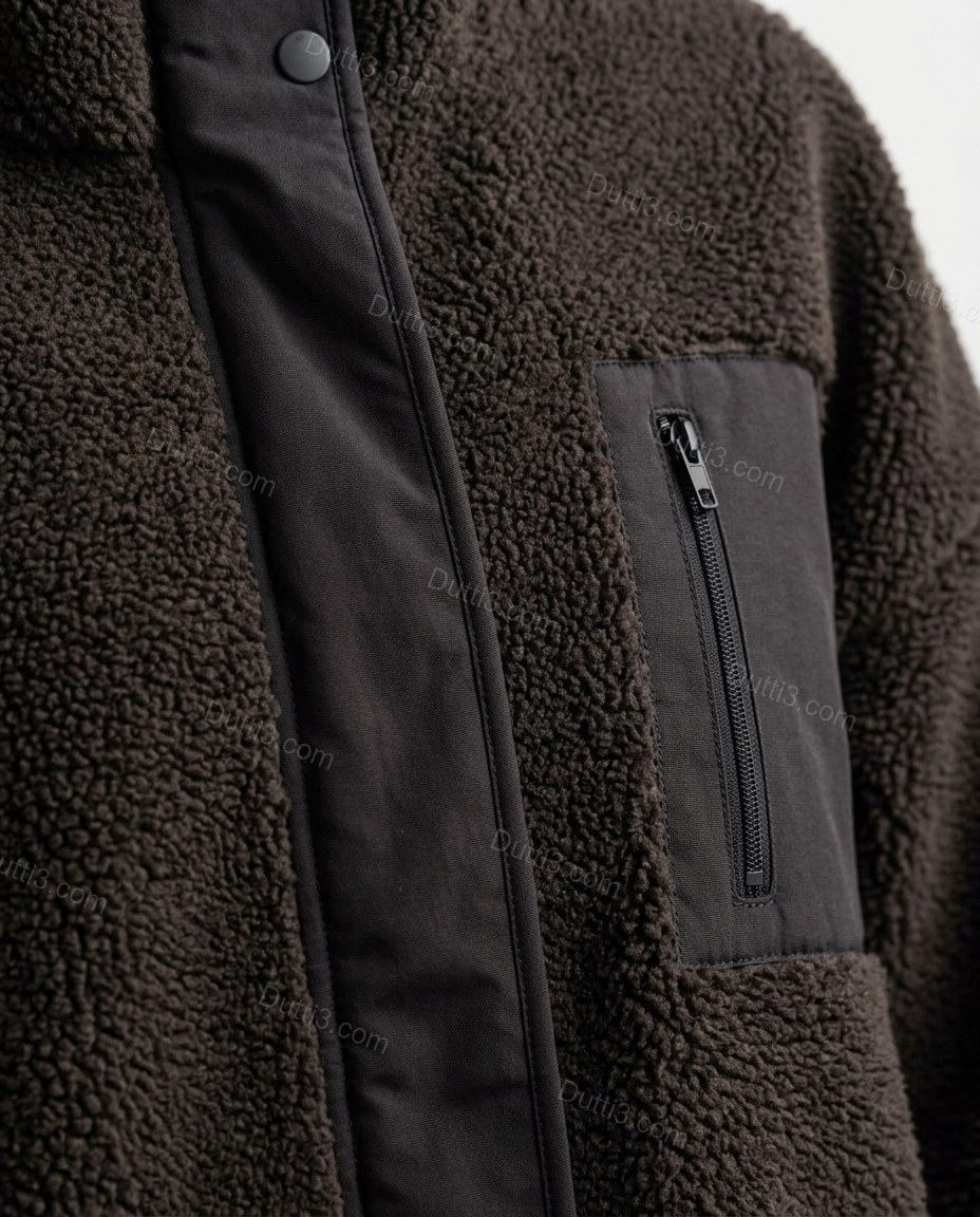 Brown Jacket, close-up of snap button closure, contrast placket and chest pocket, by Dutti3