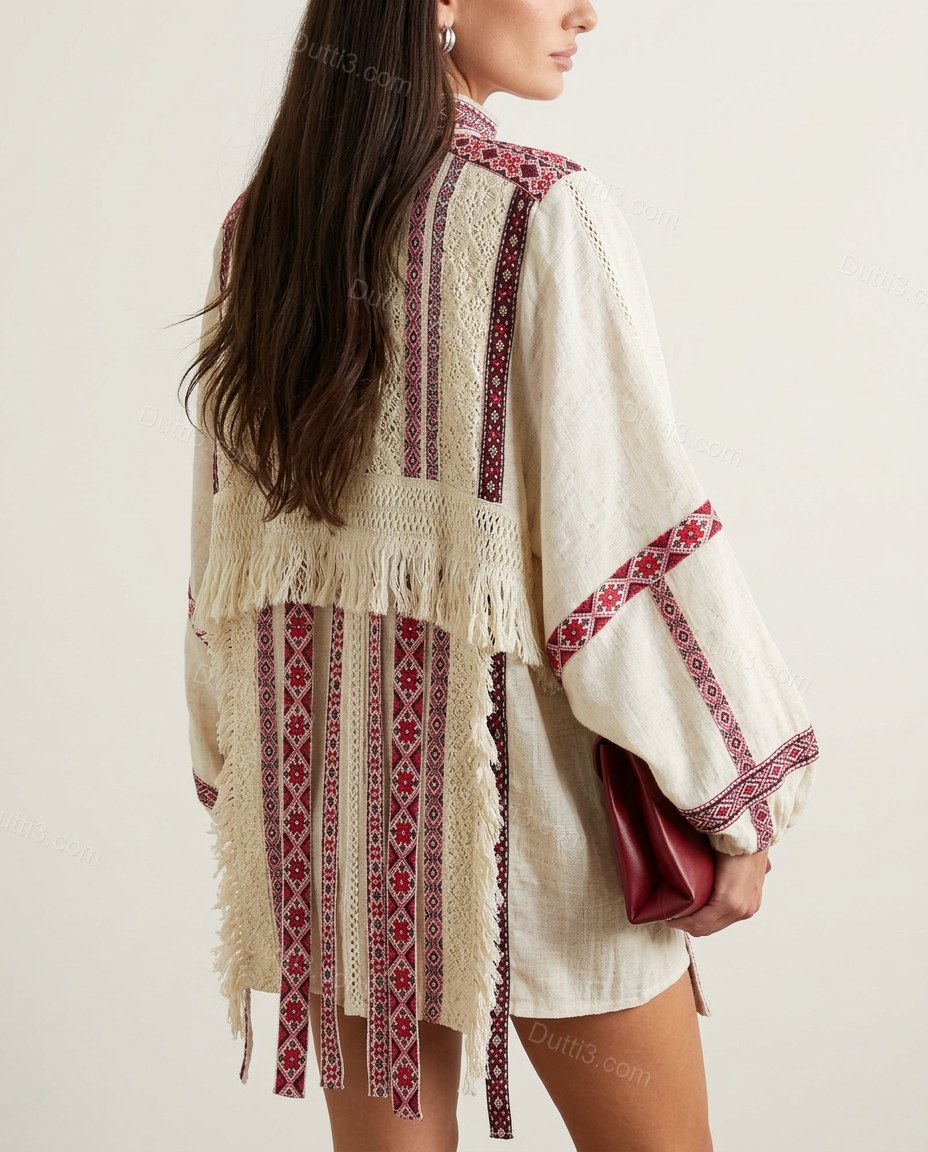 Off-white Geometric Embroidered Fringe Jacket, back studio view showing vertical embroidered geometric bands with fringe accents, by Dutti3