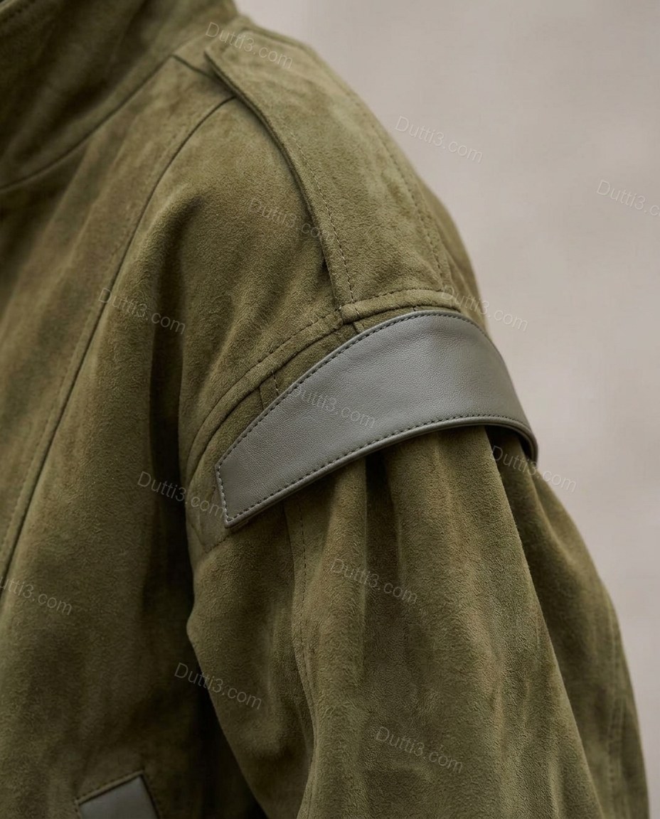 Olive Green Ribbed Jacket, close-up of dark grey accents, ribbed cuffs and ribbed hem, by Dutti3