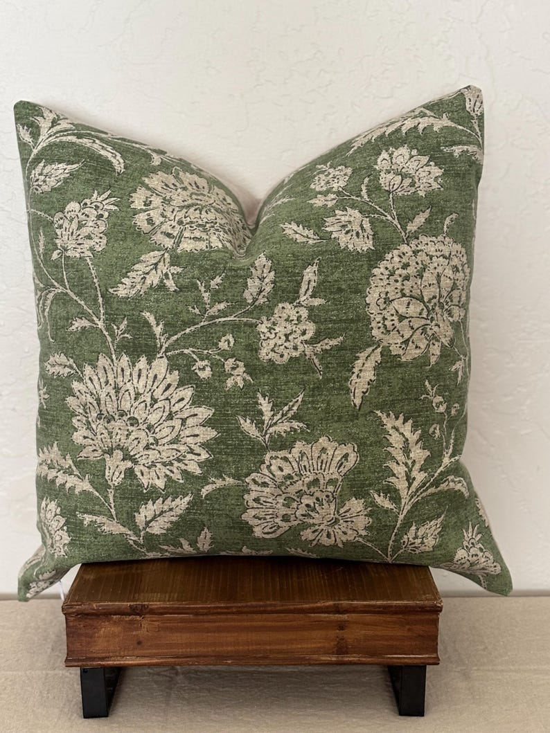 Pillow cover sham cushion in an earthy green with tan taupe flowers. Linen and cotton fabric. Bottom hidden zipper. Made to order.