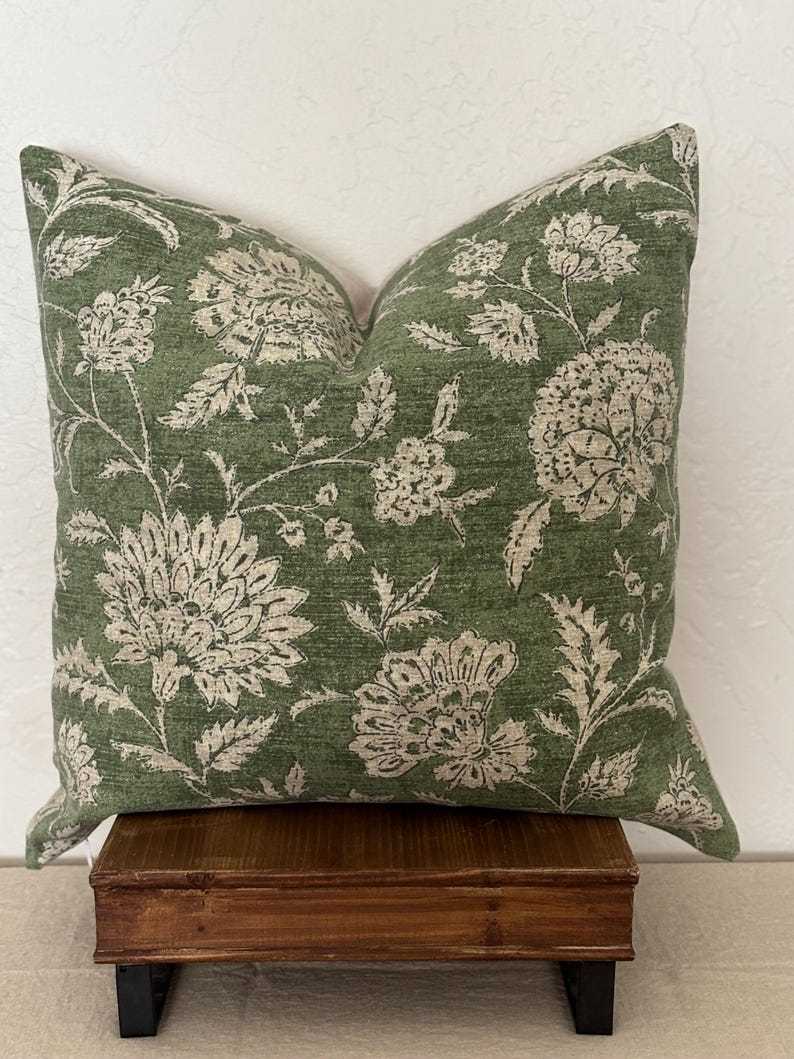 Pillow cover sham cushion in an earthy green with tan taupe flowers. Linen and cotton fabric. Bottom hidden zipper. Made to order.