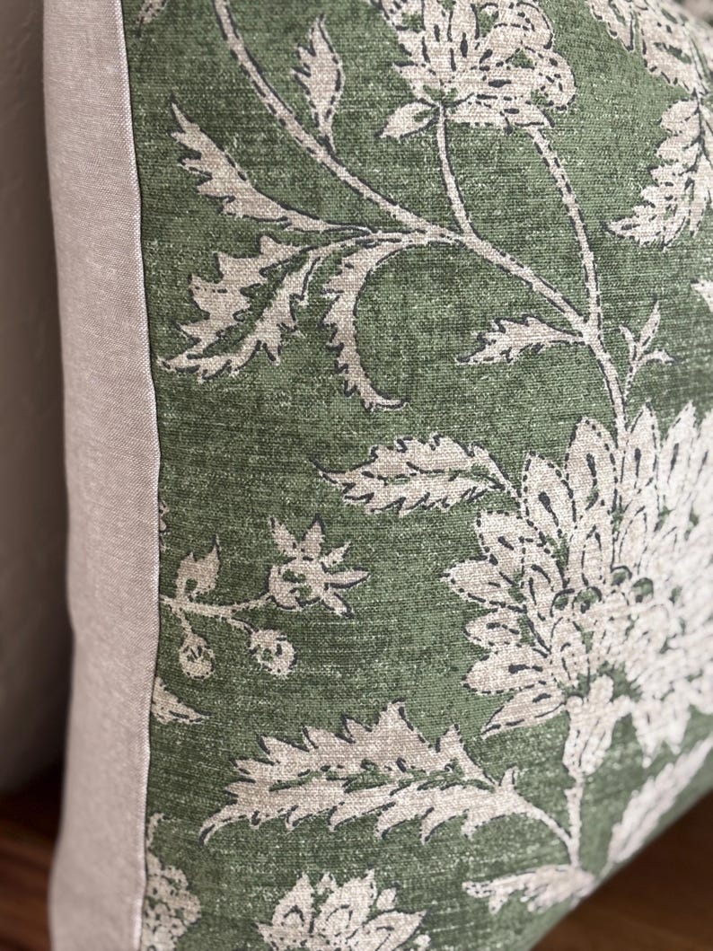 Pillow cover sham cushion in an earthy green with tan taupe flowers. Linen and cotton fabric. Bottom hidden zipper. Made to order.