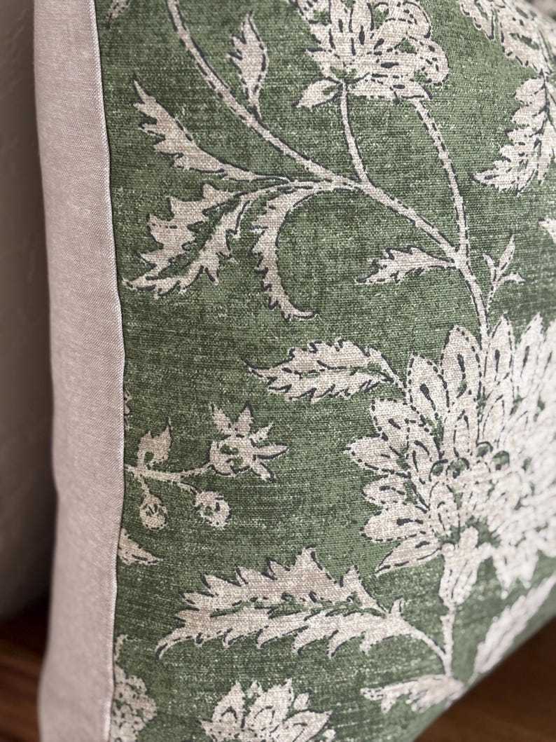 Pillow cover sham cushion in an earthy green with tan taupe flowers. Linen and cotton fabric. Bottom hidden zipper. Made to order.