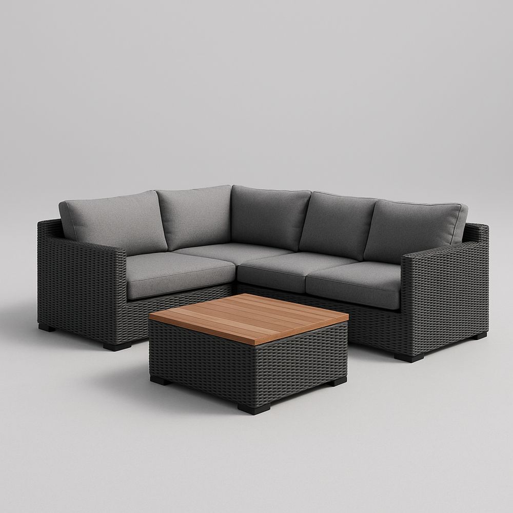 Divano angolare in rattan sintetico con cuscini grigi e tavolino in legno