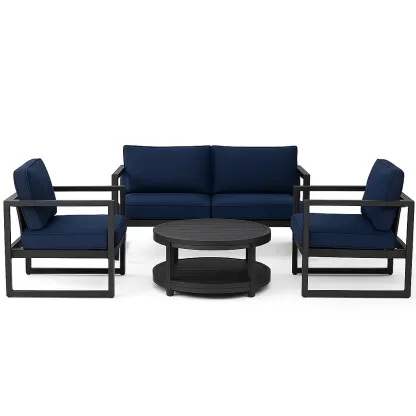 Set conversazione in alluminio con cuscini blu e tavolino rotondo