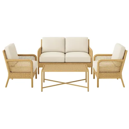 Set conversazione in vimini con cuscini color crema